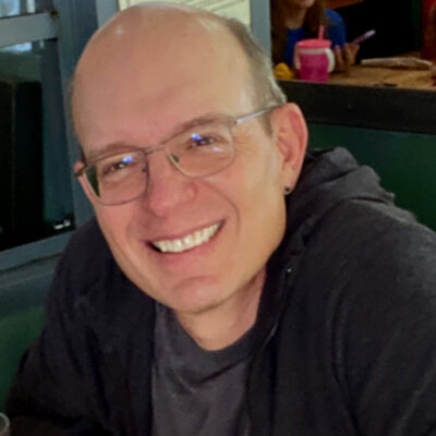 Headshot of Miller Tobin smiling at camera.